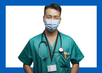 médico com avental, estetoscópio e máscra no rosto